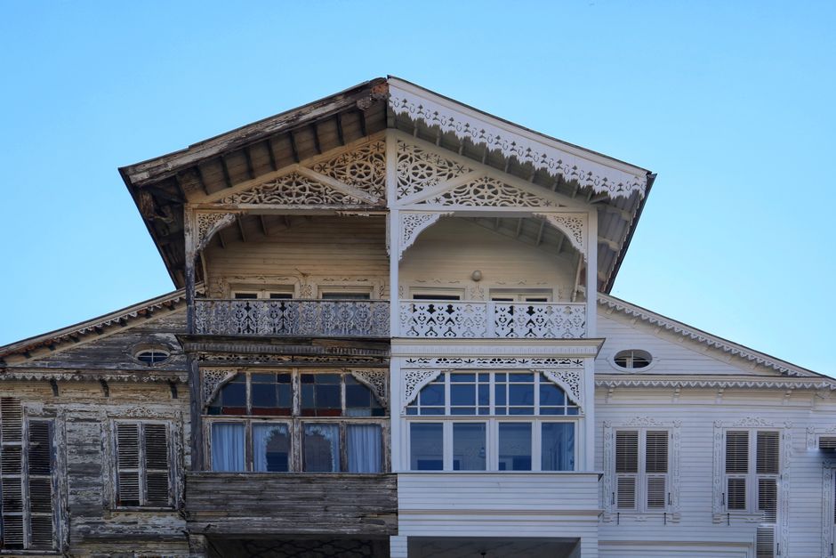 Exterior home renovation project showing energy efficiency upgrades